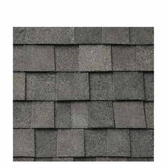 A close-up view of dark gray, textured asphalt roof shingles arranged in an overlapping pattern.