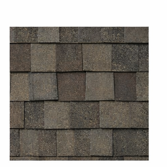 A sample of textured, brown asphalt architectural roofing shingles arranged in an overlapping pattern.