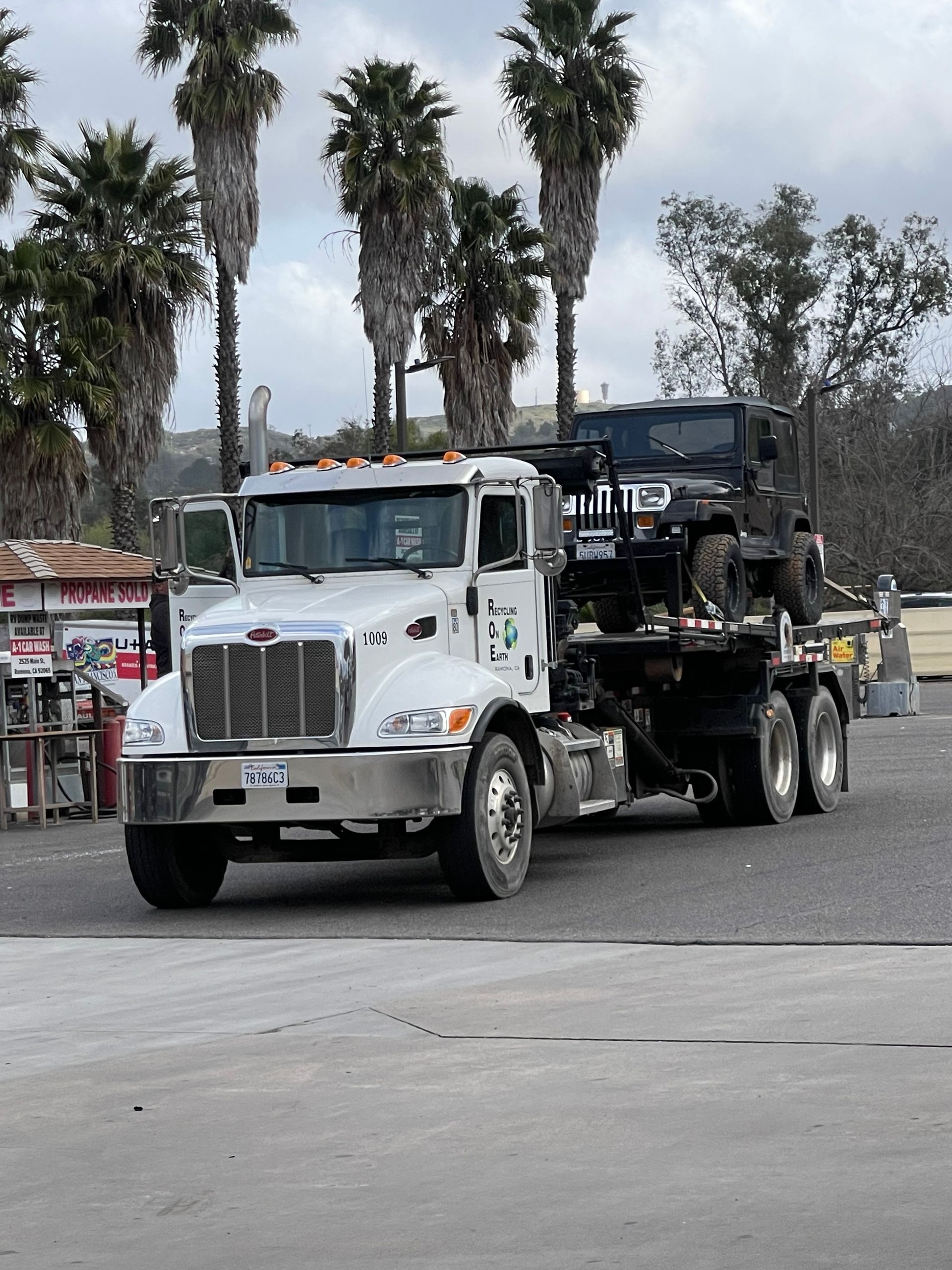 A white truck with the number 15 on the front