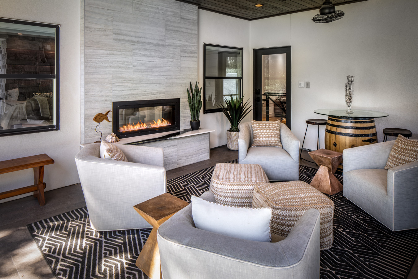 A living room filled with furniture and a fireplace.