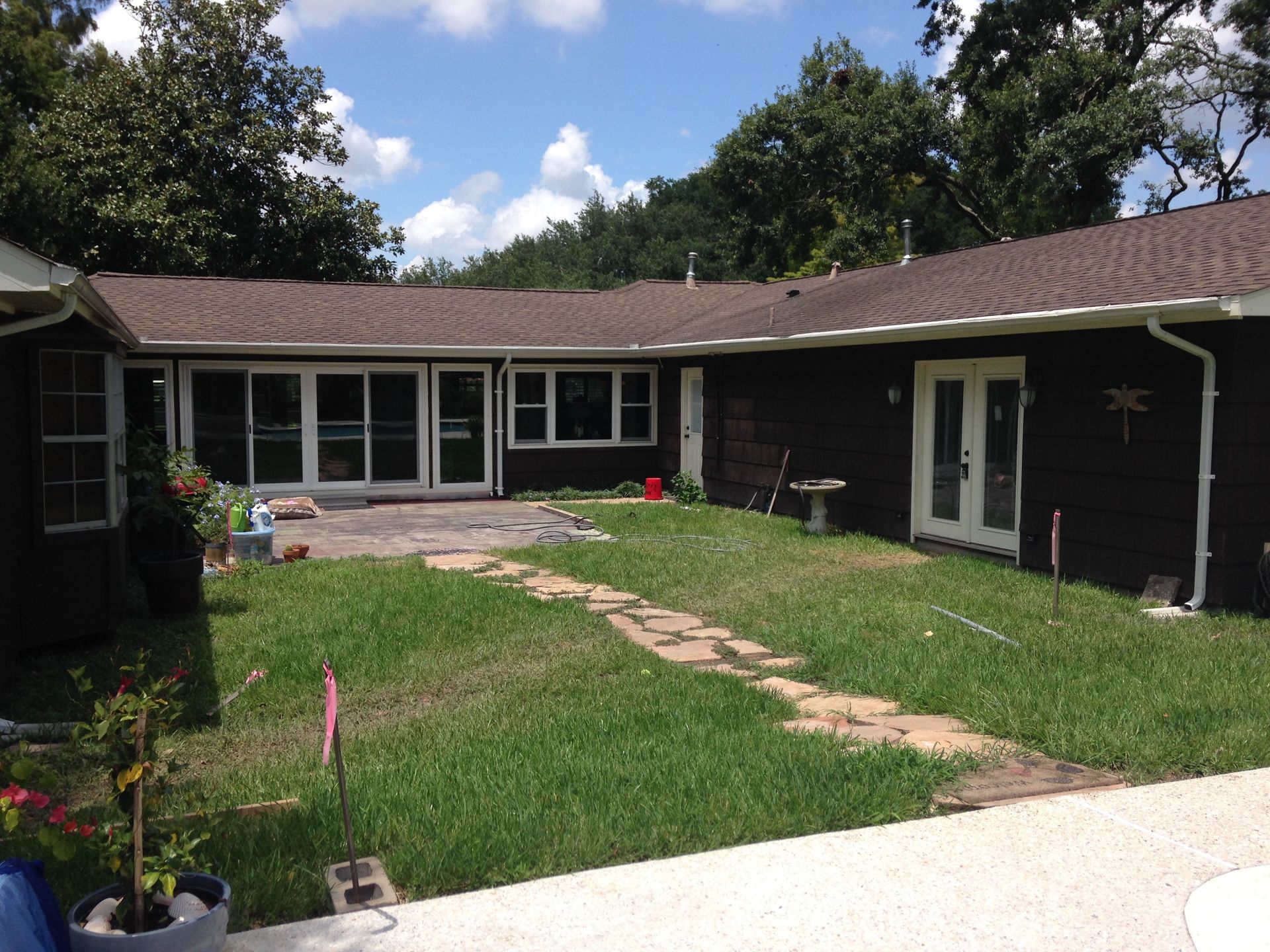 A large house with a large lawn in front of it