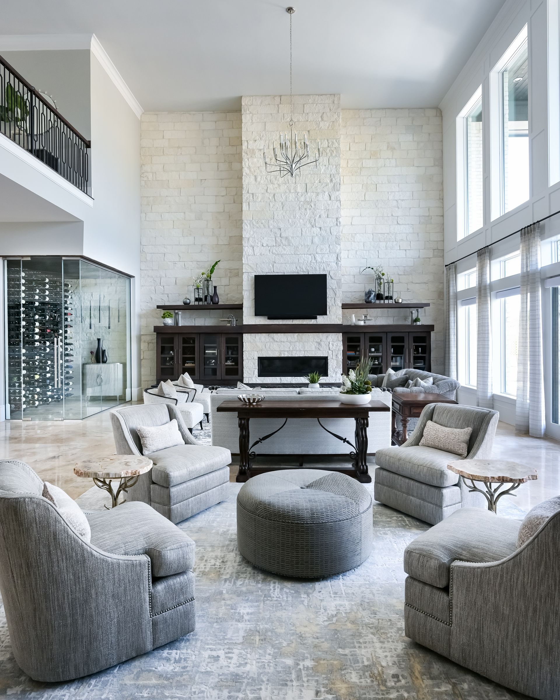 A living room filled with furniture and a fireplace.
