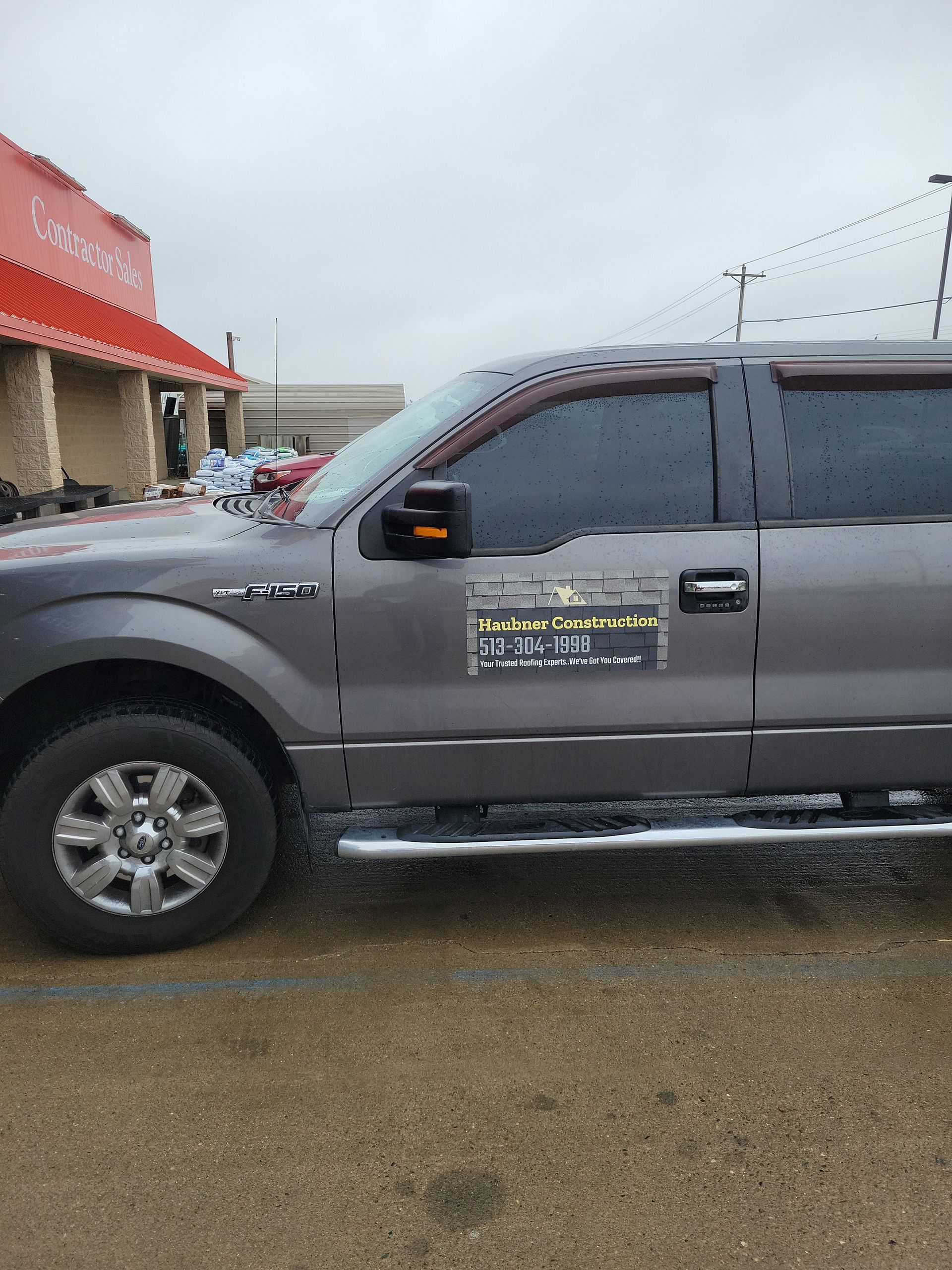 Haubner Construction truck in Hamilton, OH at a roofing jobsite