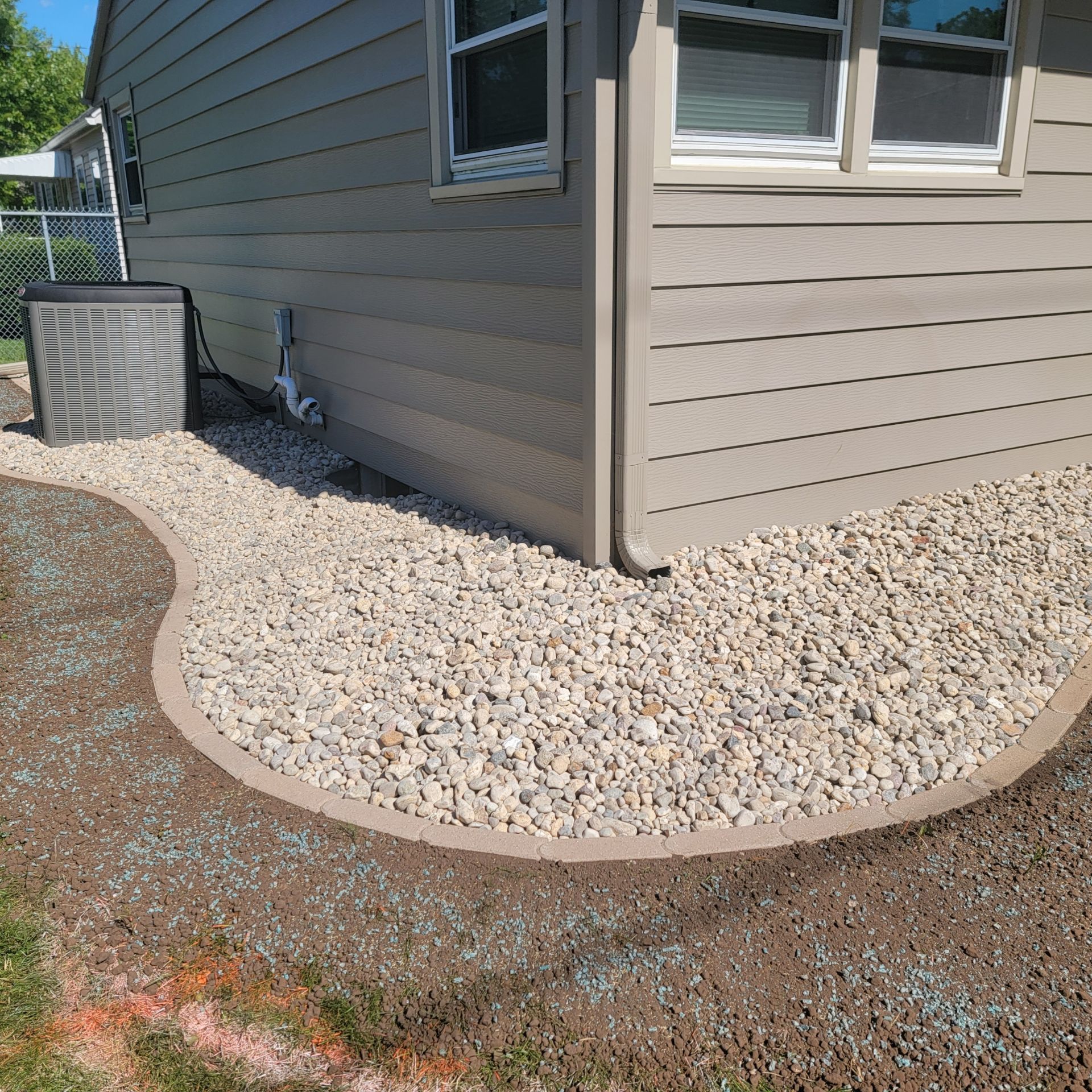 A house with a waterproofing grading and edging