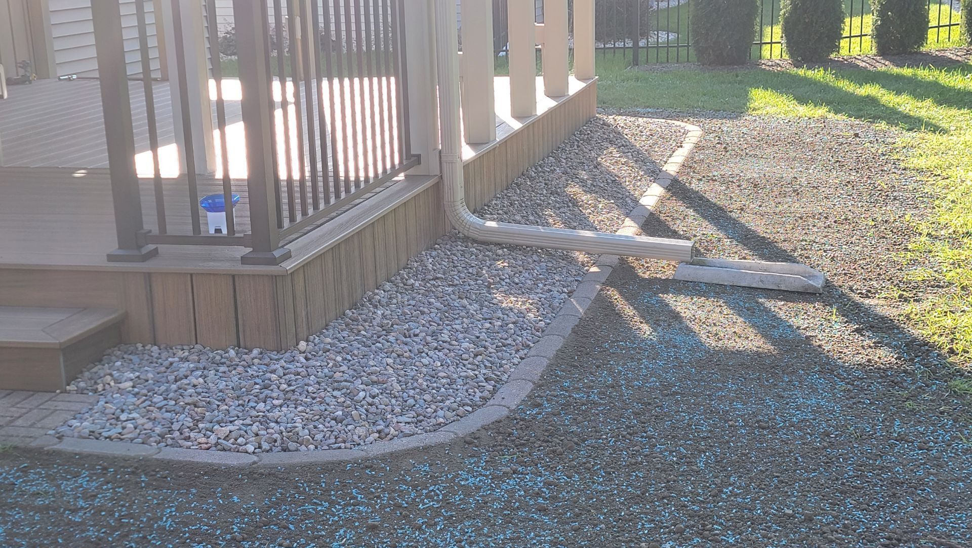 Gravel and edging surround patio deck