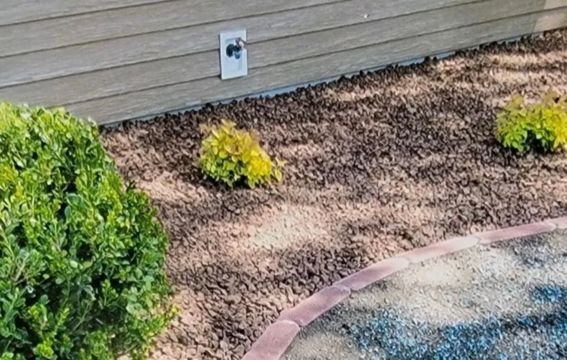 house with pavers edging landscaping