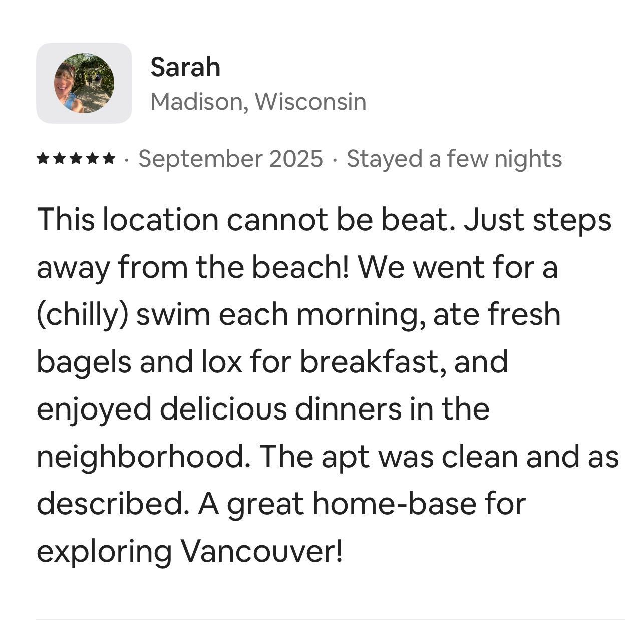 Five-star review from Sarah in Madison, WI, dated September 2025, praising a clean Vancouver apartment near the beach.