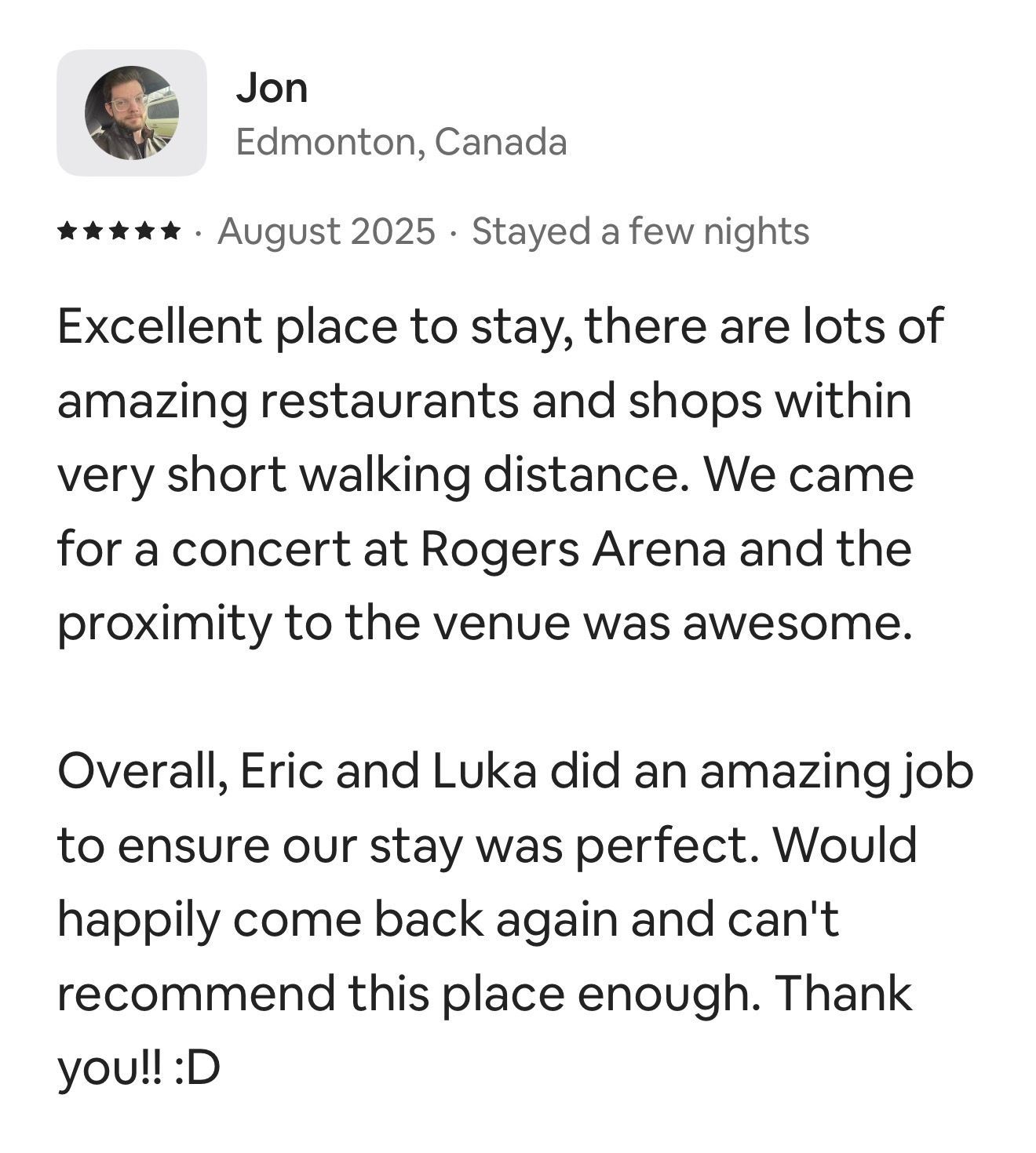 A five-star review from Jon in Edmonton, Canada, praising a stay's proximity to Rogers Arena and service by Eric and Luka.