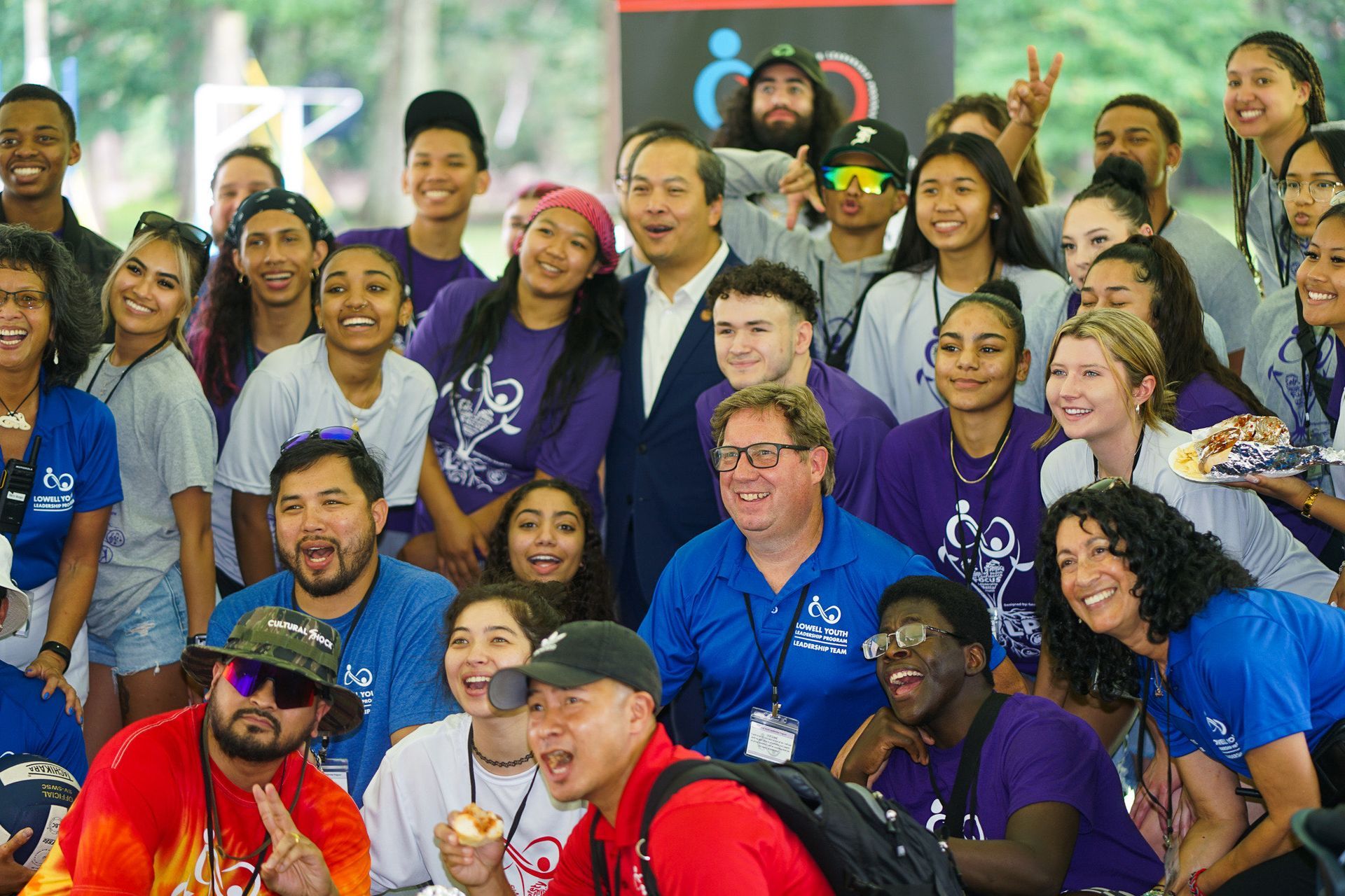 A large group of people are posing for a picture.