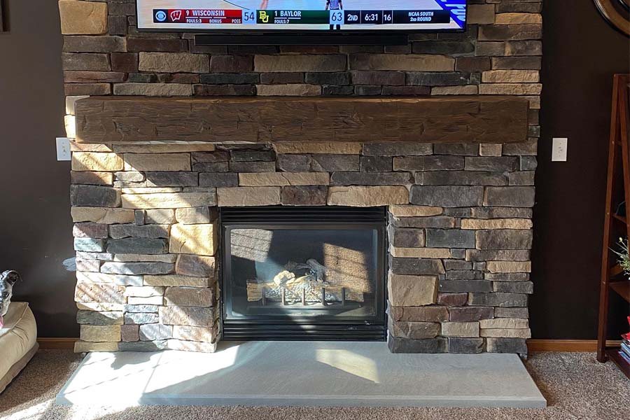 Hand Hewn barn beam fireplace mantel