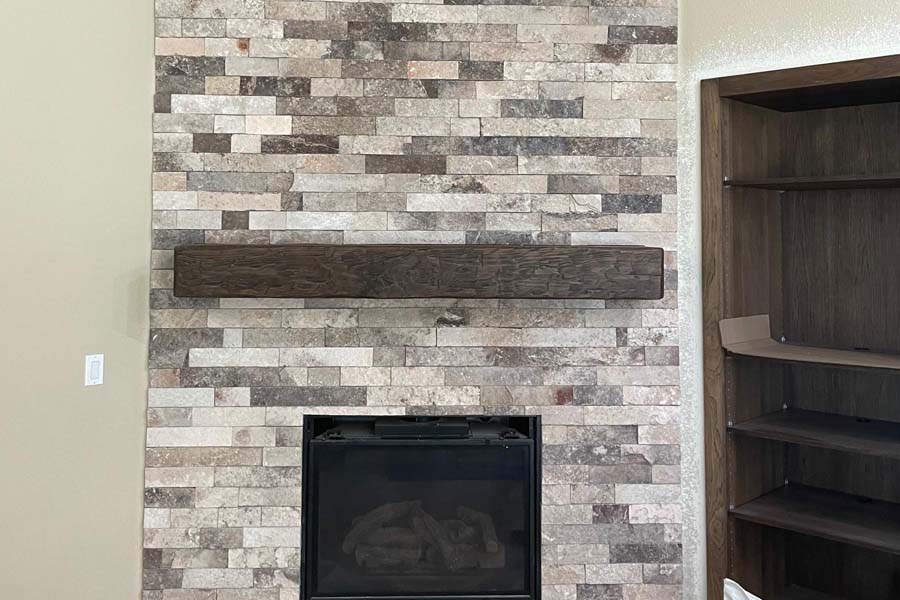 Barnwood reclaimed rustic wood fireplace mantel hand hewn and Amish crafted