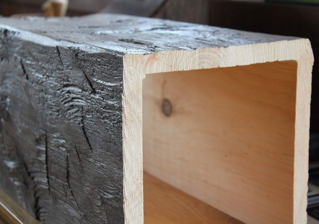 Rustic hand hewn box beam covers made from Amish craftsmanship
