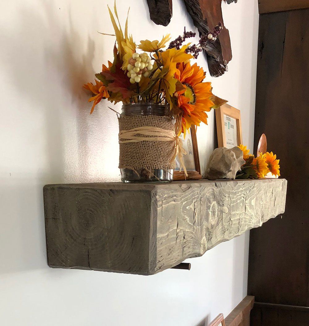 Solid wood hand hewn rustic accent floating shelf