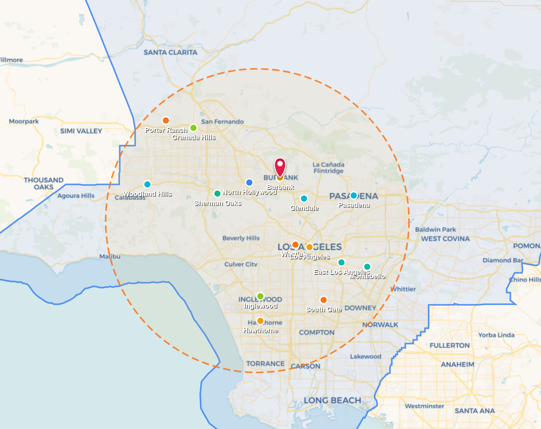 Map with a green and blue outlined region, clustered markers, and a dashed circular area around central locations