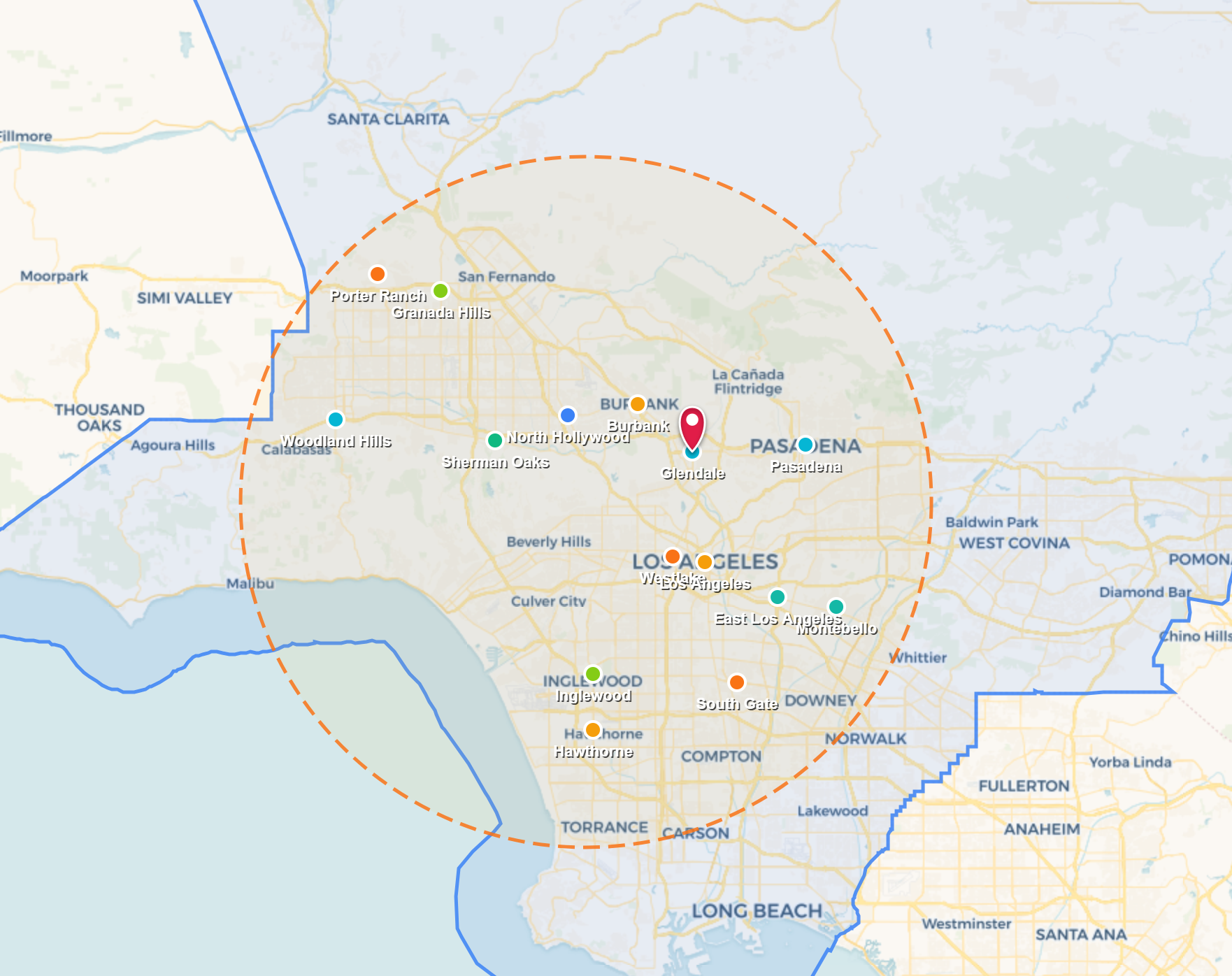Map with green and blue outlined regions, a red location pin, and a dashed orange radius circle.