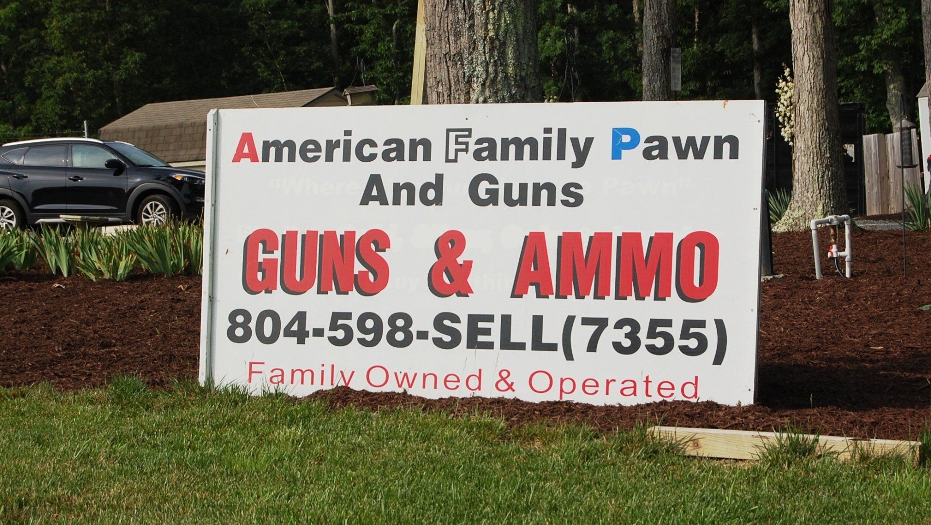 Powhatan Gun Shop — Pawn Shop Sign in Powhatan, VA