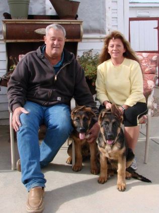 Family Couple With Their Dogs