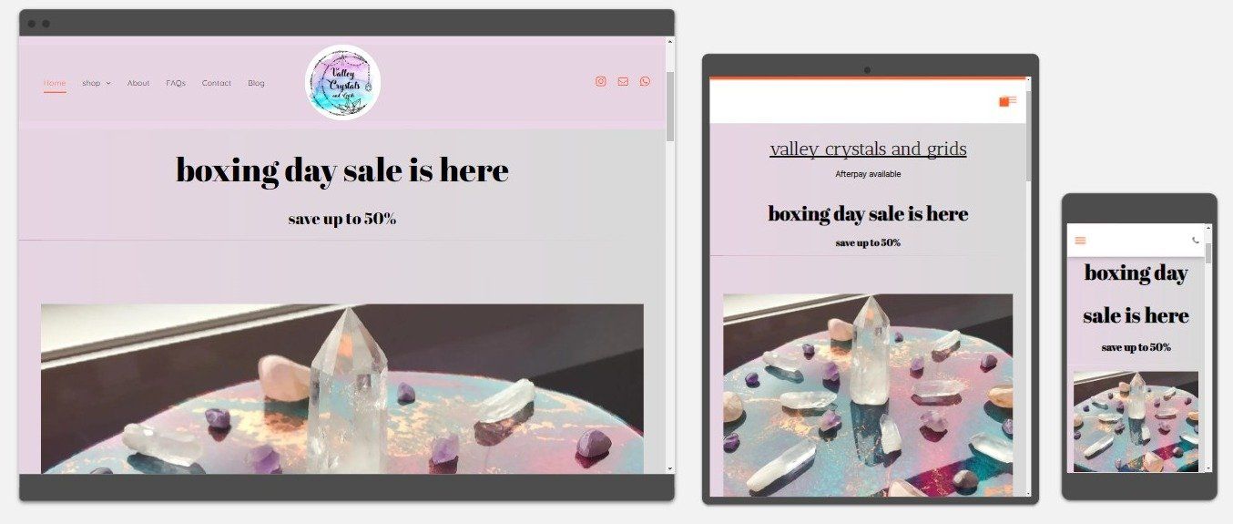 Website mockup on laptop, tablet, and phone displays, showcasing a sale with crystals.