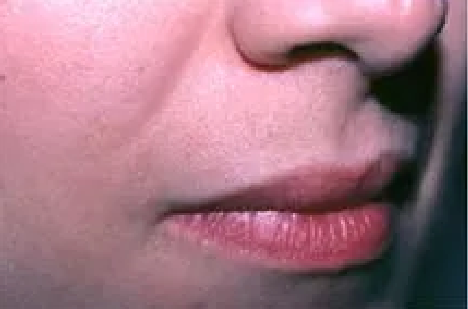 A close up of a woman 's mouth and nose.