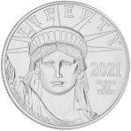 A silver coin with the face of the statue of liberty on it.