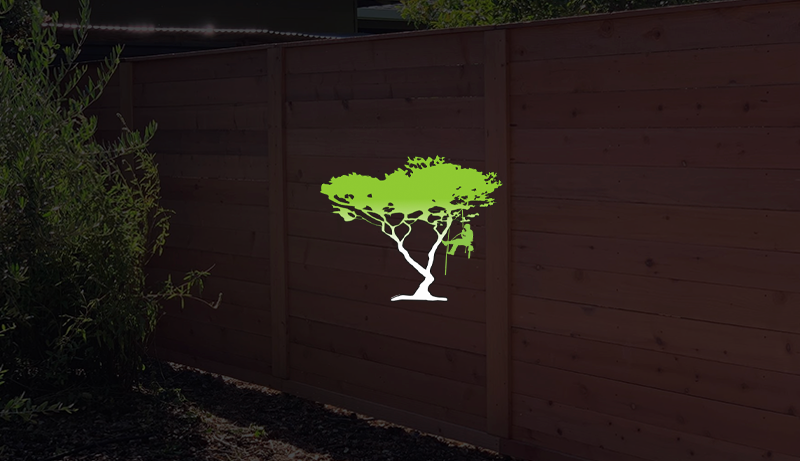 A green tree is on a yellow background.