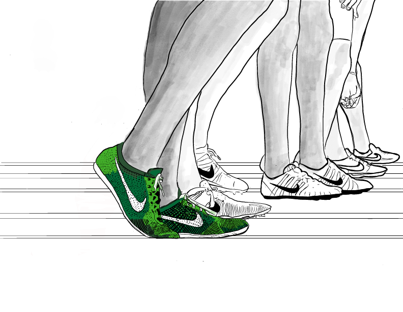 Runners feet in motion; green Nike shoe in focus.