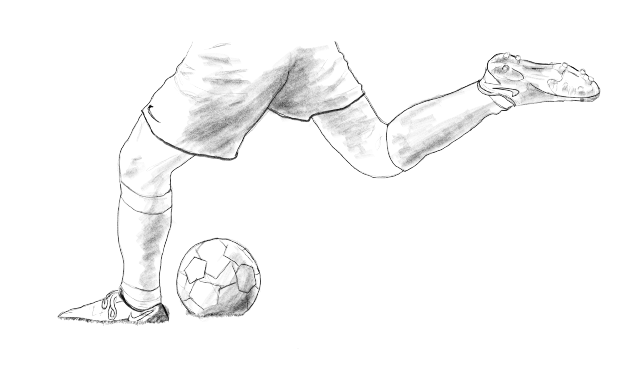 Soccer player kicking ball.
