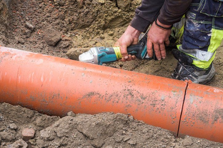 Man Fixing a Sewer Line | Belleville, IL | Davinroy Plumbing