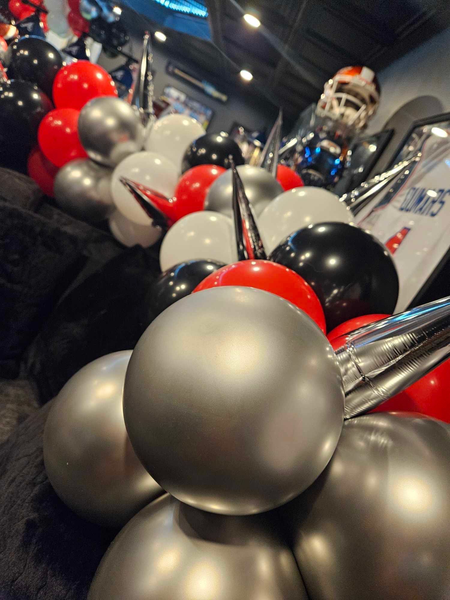 A bunch of balloons are stacked on top of each other