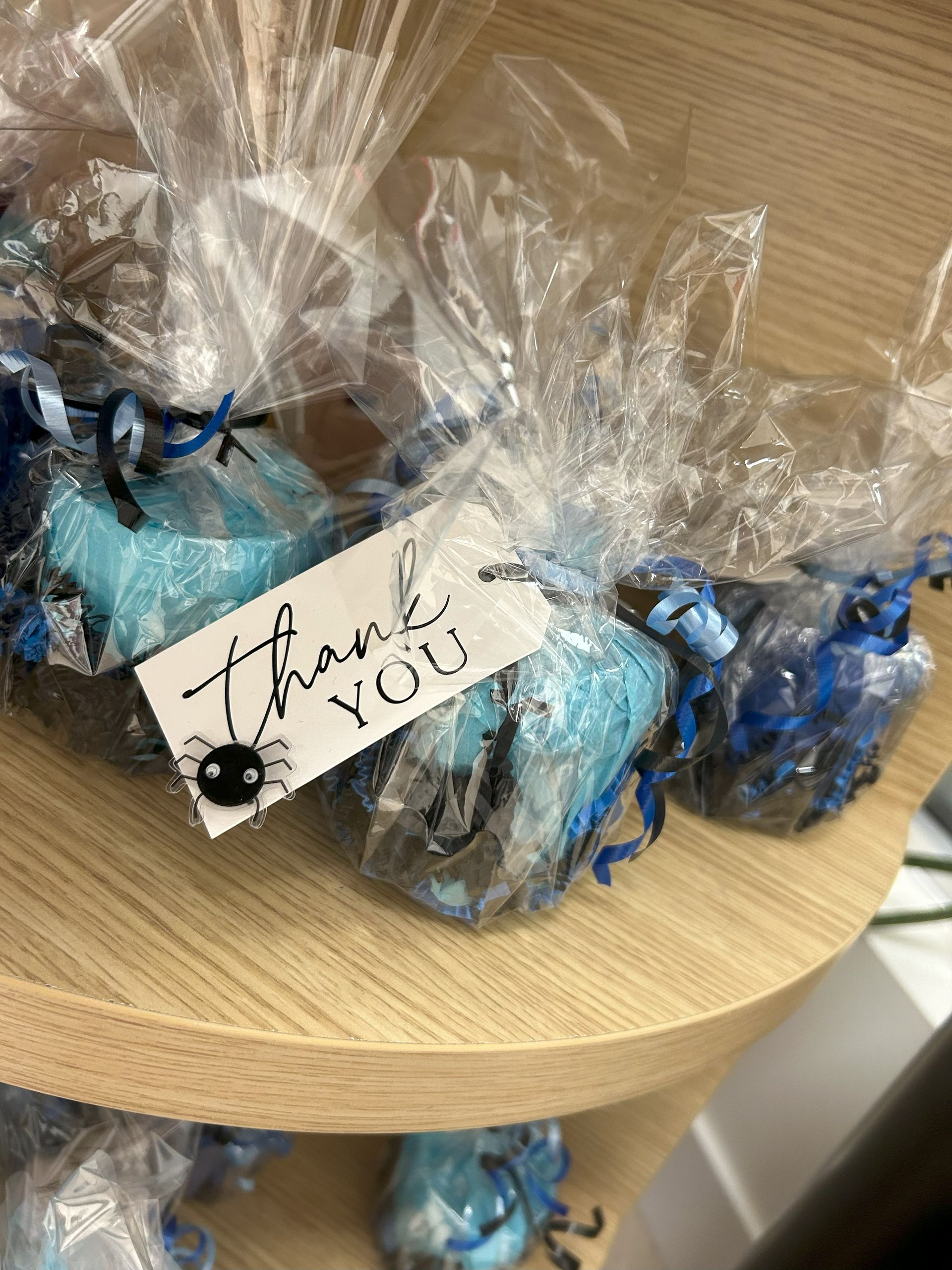 A thank you tag is attached to a bag of marshmallows.