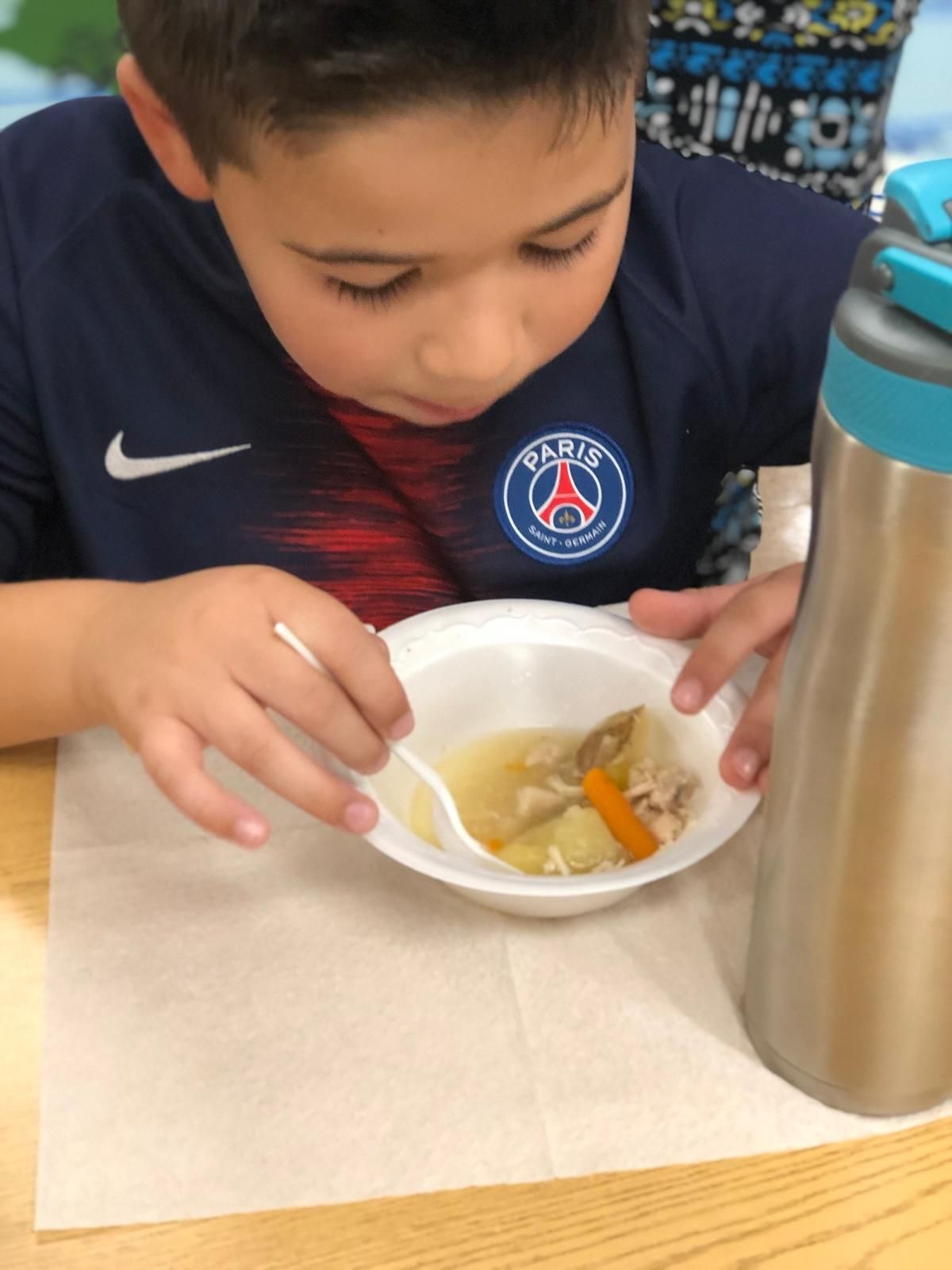 Group of children eating together