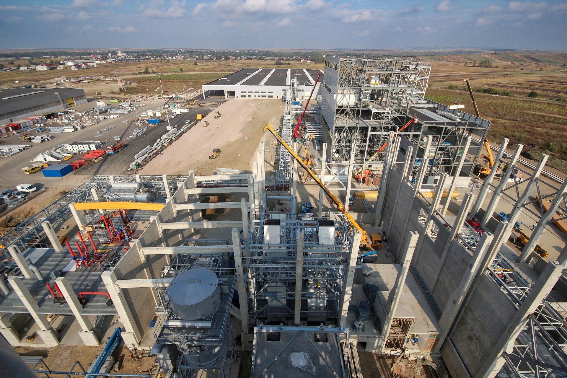 An aerial view of a large building under construction.