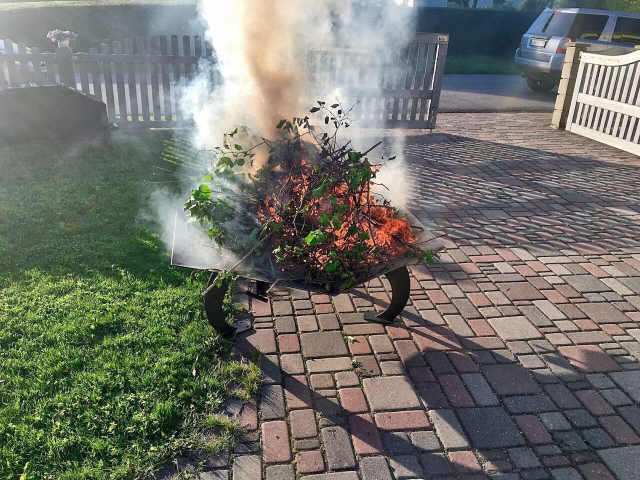 A fire pit with smoke coming out of it