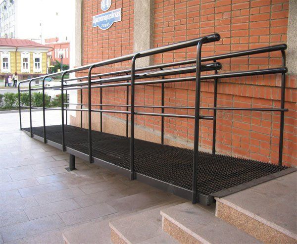 A ramp leading up to a brick building