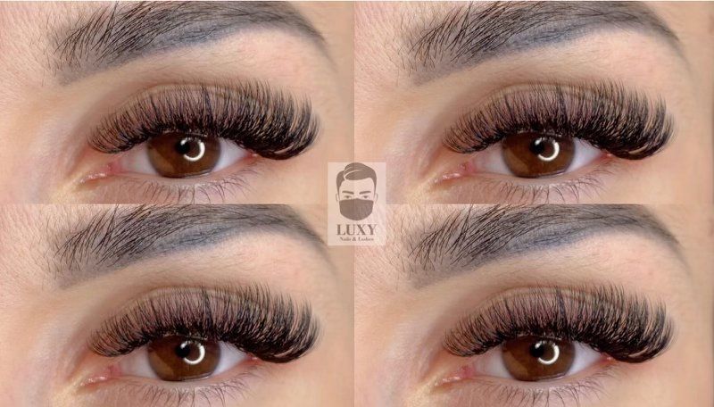 Eine Nahaufnahme der Augen einer Frau mit langen Wimpern.