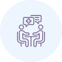 Two figures seated at a table, discussing healthcare in thought bubbles with a medical symbol.