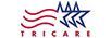 Logo for TRICARE, a healthcare program. It features red stripes and blue stars. The word 