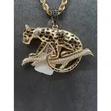 Jaguar bedel hanger goud