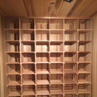 Wooden cubby shelves built into a wall.