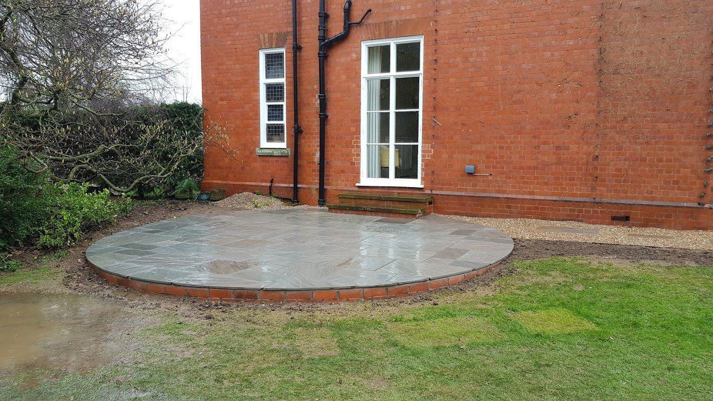 Grey sandstone paving in a garden