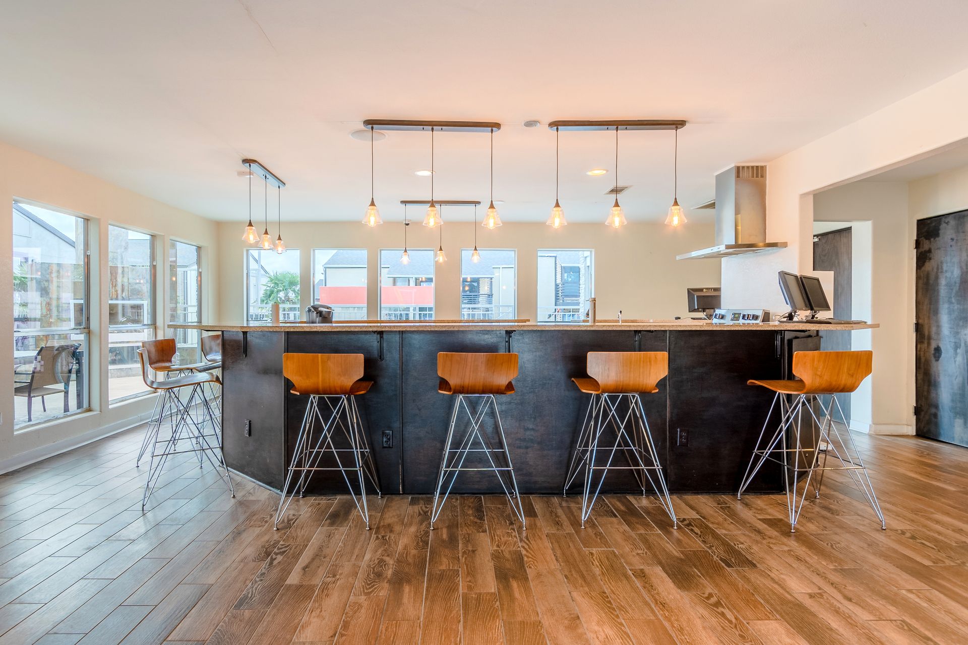 Photo of a barstool seating area in the community clubhouse
