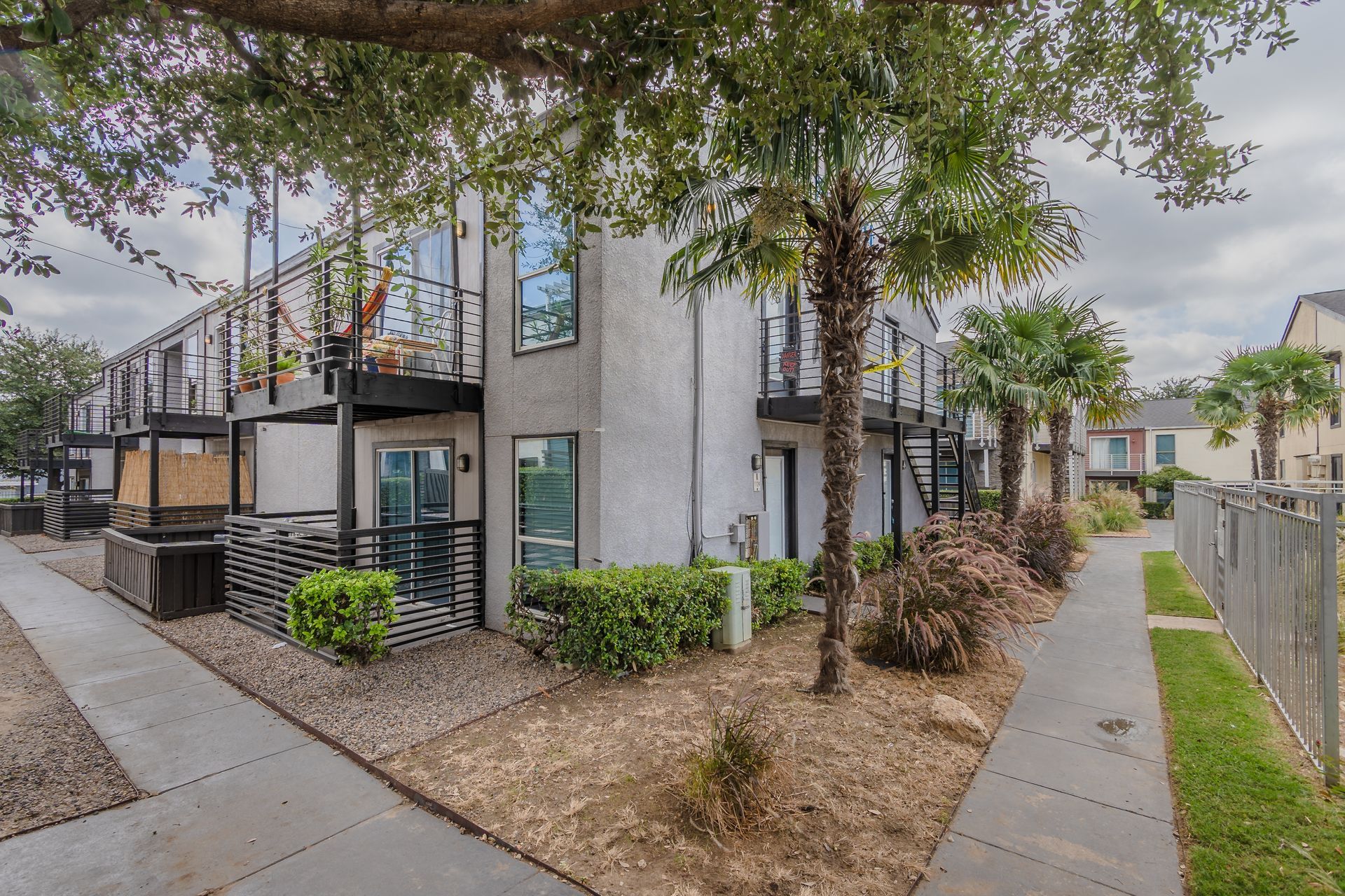 Photo of a two-story building on a cloudy day