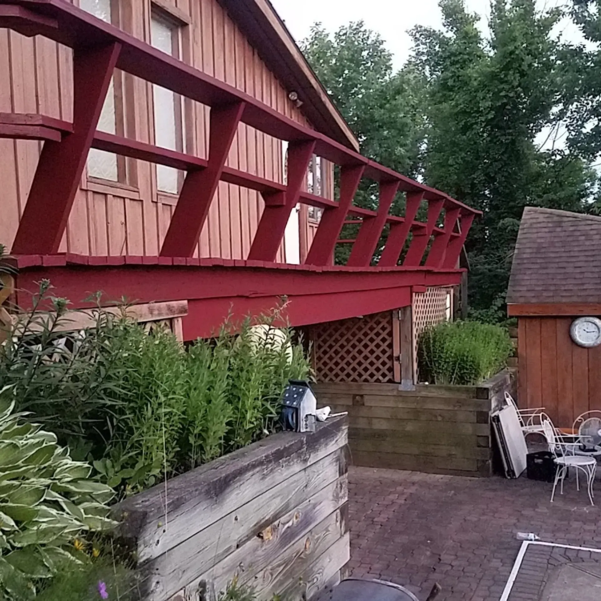Ck Maintenance - A bathroom with a sliding glass shower door and a window