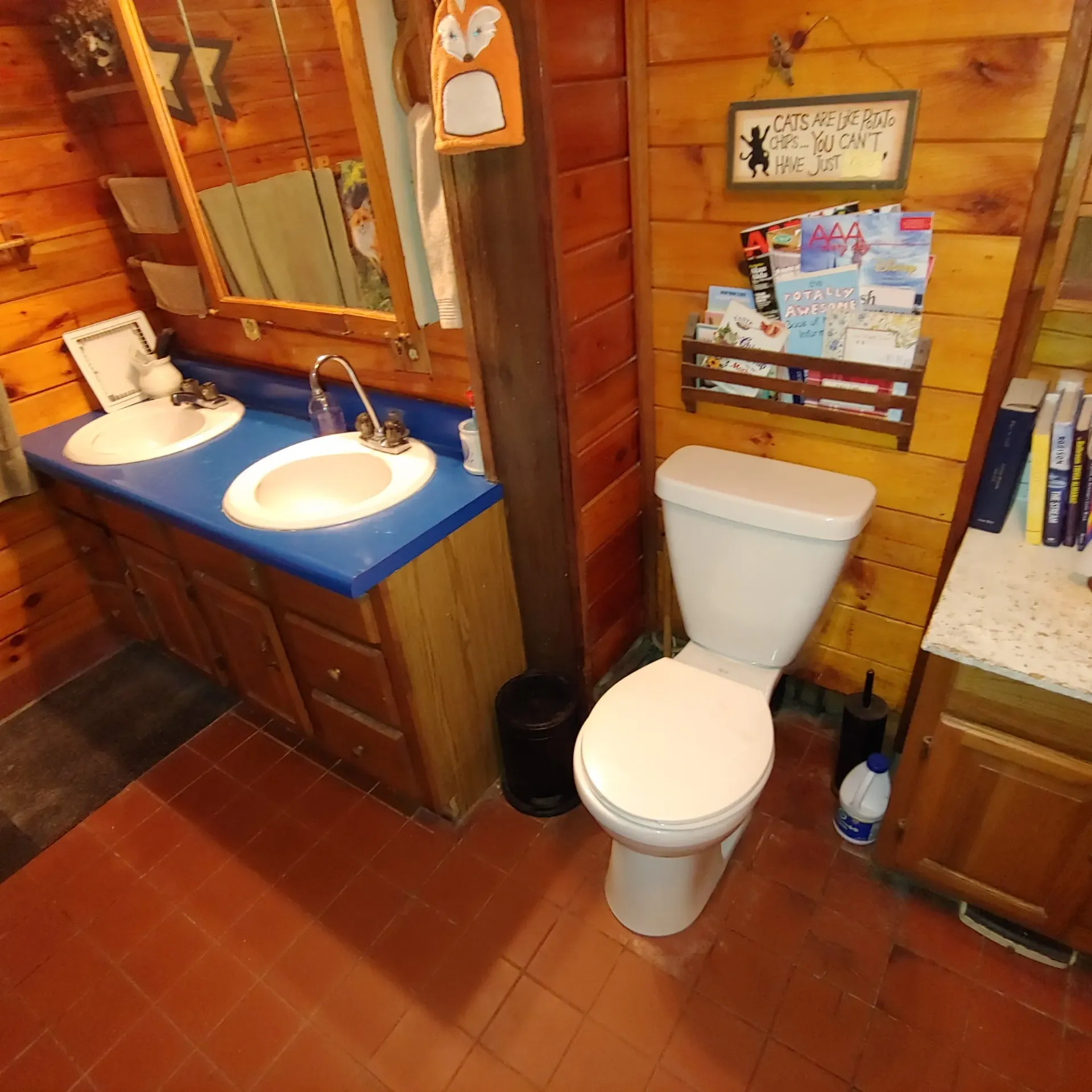 Ck Maintenance - A blue chair is sitting in front of a wall with white blinds.