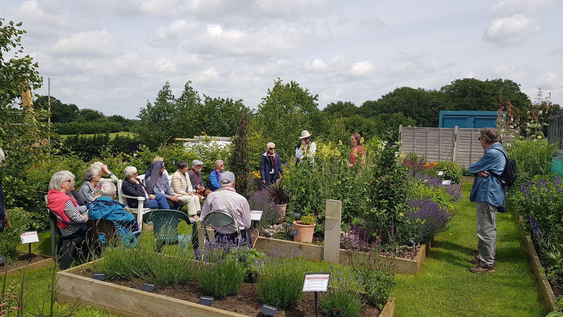 Group of Society members visiting Katie's Garden in Newbourne.
