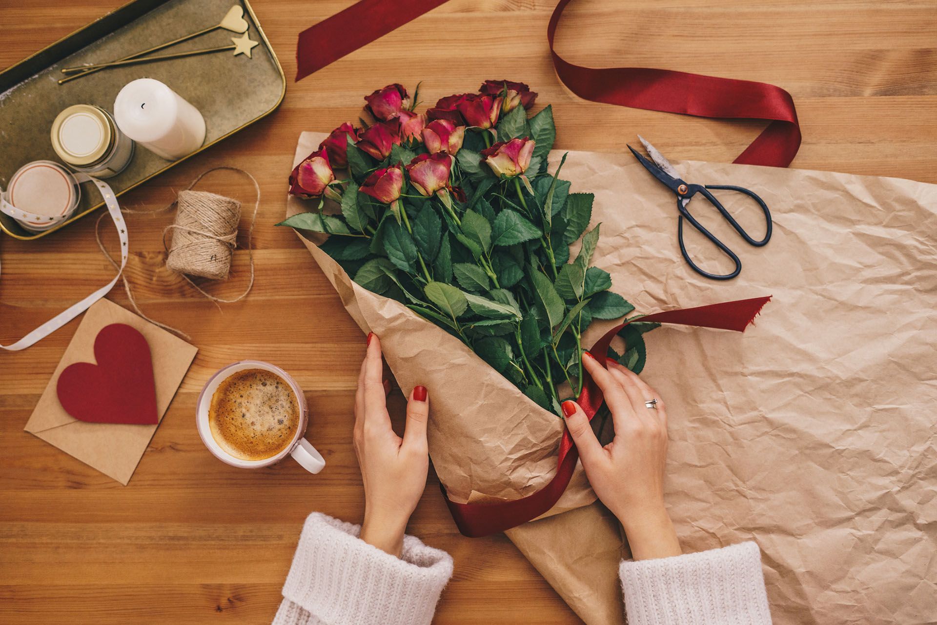 Woman Making a Bouquet — Montrose, PA — Sunset Floral