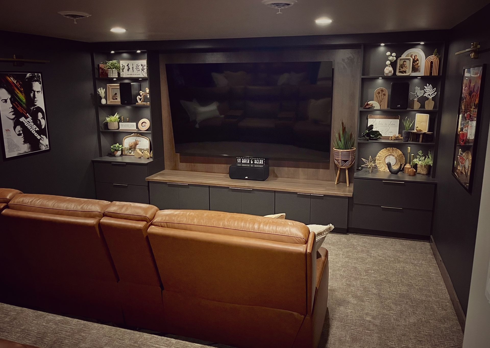 An empty basement with hardwood floors and stairs