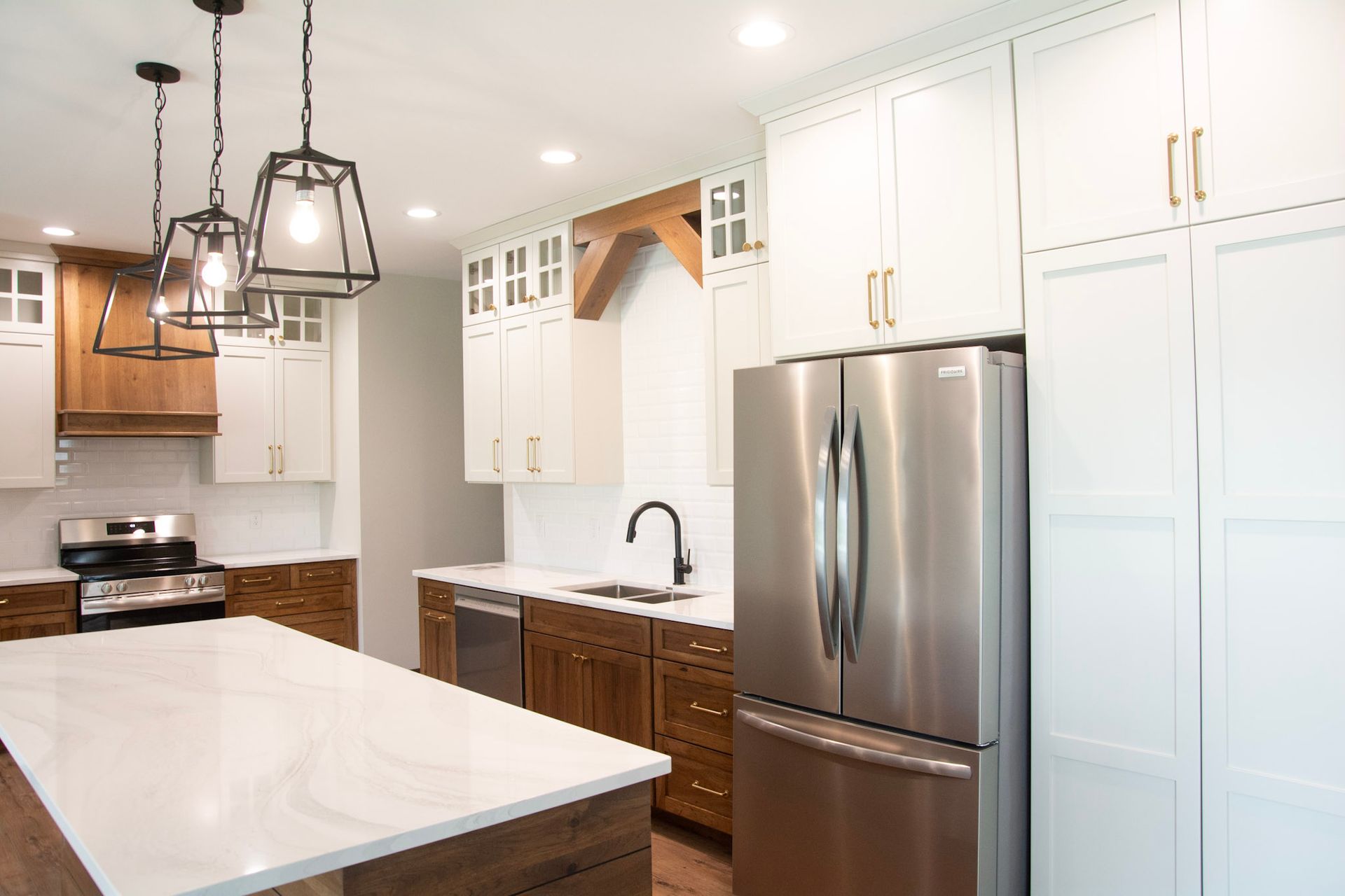 There is a large island in the middle of the kitchen.