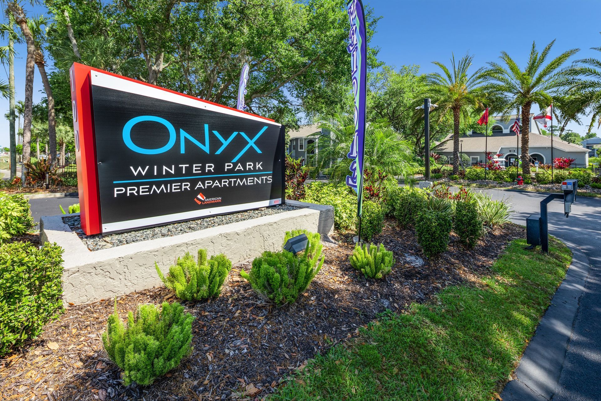 A sign for onyx winter park premier apartments