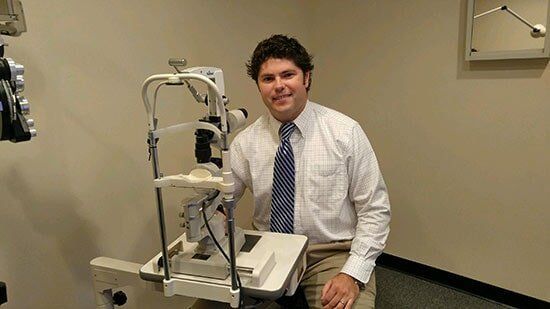 Optician Dr. Reach getting ready to peform a routine eye exam- professional eye care services in Knoxville, TN